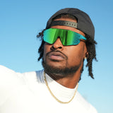 Ross500 wearing LosReyes Elevate Cactus sport sunglasses with mirrored green lens and outdoor vibe.