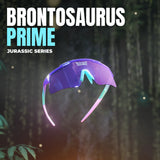 Promotional jungle-themed graphic of LosReyes Prime Jurassic Brontosaurus sunglasses in bold purple with gradient fade temples, oversized shield lens, and Jurassic Series branding for youth and adult athletes.