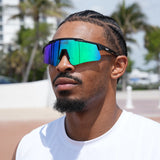 Basketball player in side view wearing LosReyes Prime Polarized green sunglasses – cutting-edge athletic eyewear with bold mirrored finish