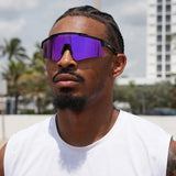 Side view of baller sporting purple reflective polarized sunglasses from LosReyes – athletic eyewear that turns heads
