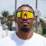 Outdoor basketball athlete rocking yellow-tinted LosReyes Prime Polarized sunglasses – elite eye protection with style