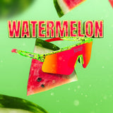 Product graphic of LosReyes Prime Youth Watermelon sunglasses floating over sliced watermelon, highlighting red mirrored shield lenses, green speckled wrap frame, and UV400 protection.