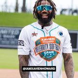 NFL star @iamxavienhoward wearing LosReyes blue mirrored wraparound sports sunglasses at the 2023 Celebrity Softball Game, showcasing premium performance shades designed for athletic excellence and bold outdoor style