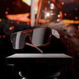 Ares polarized sports sunglasses made from premium acetate with anti-scratch, sweat-resistant, saltwater-safe lenses displayed in a dramatic dark setting.