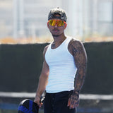 Athlete wearing LosReyes Peach sunglasses holding pickleball paddle