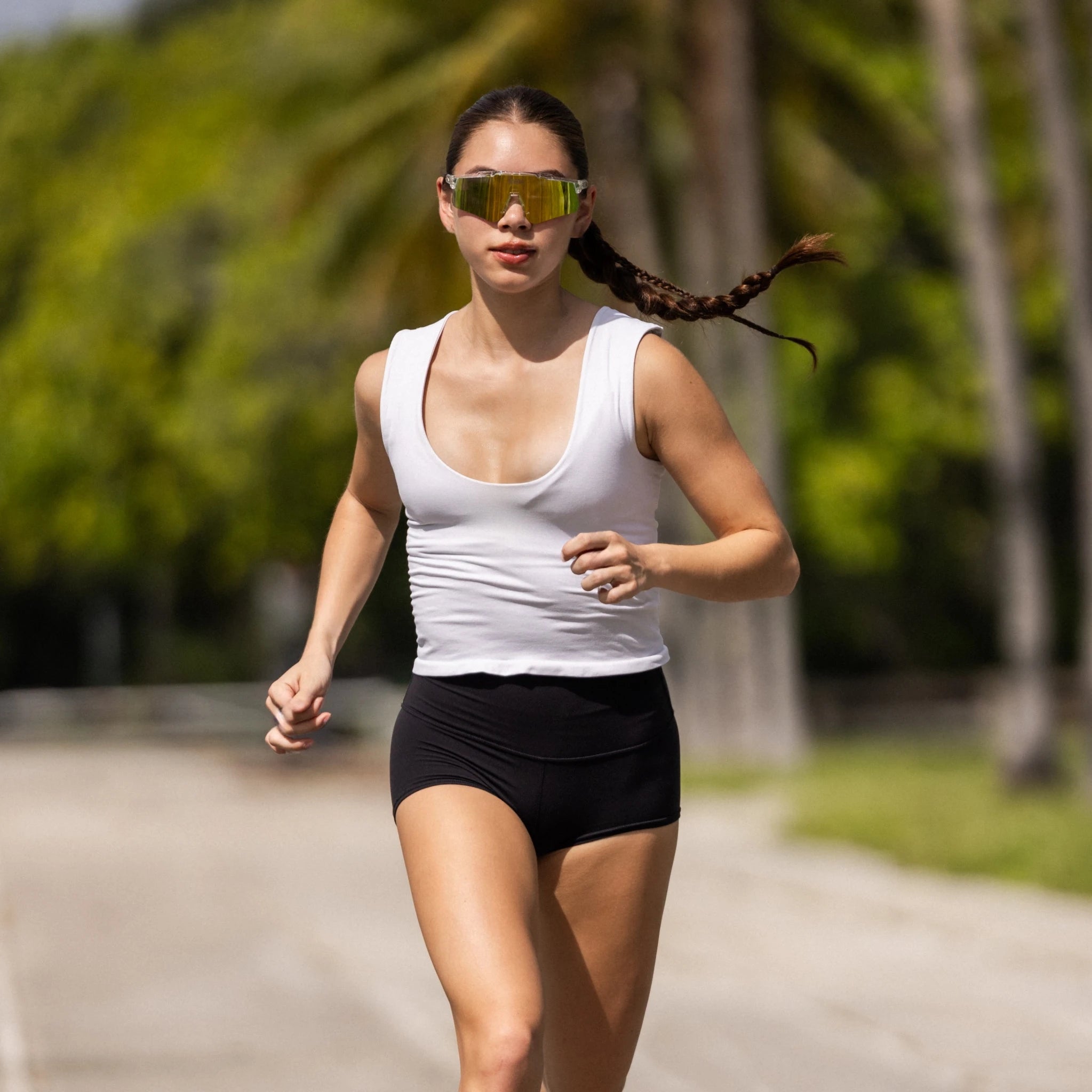 LosReyes Saturn shades featuring a wide reflective performance lens for running and high-movement workouts.