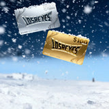 Three LosReyes gift cards in silver, gold, and bronze on a snowy background.