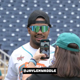 Jaylen Waddle wearing Blue raz Elevate sunglasses LosReyes at a media day.