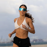 Runner wearing LosReyes Blue Raz running sunglasses, delivering full UV400 protection, aerodynamic TR90 frames, and crystal-clear shield vision built for speed and endurance.