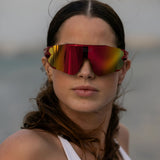 LosReyes Elevate Cherry red mirrored sport sunglasses — dynamic, lightweight eyewear for runners and athletes, priced under $50.