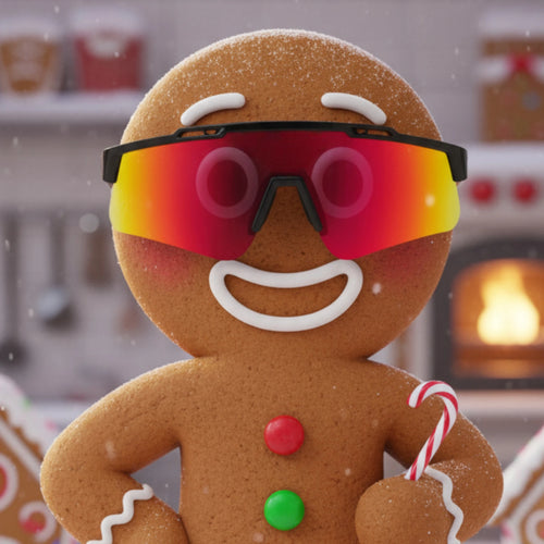 Gingerbread man wearing LosReyes sunglasses holding a candy cane — playful holiday gift inspiration.