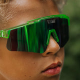 Close-up of youth wearing LosReyes Jurassic Series Pterodactyl green sunglasses