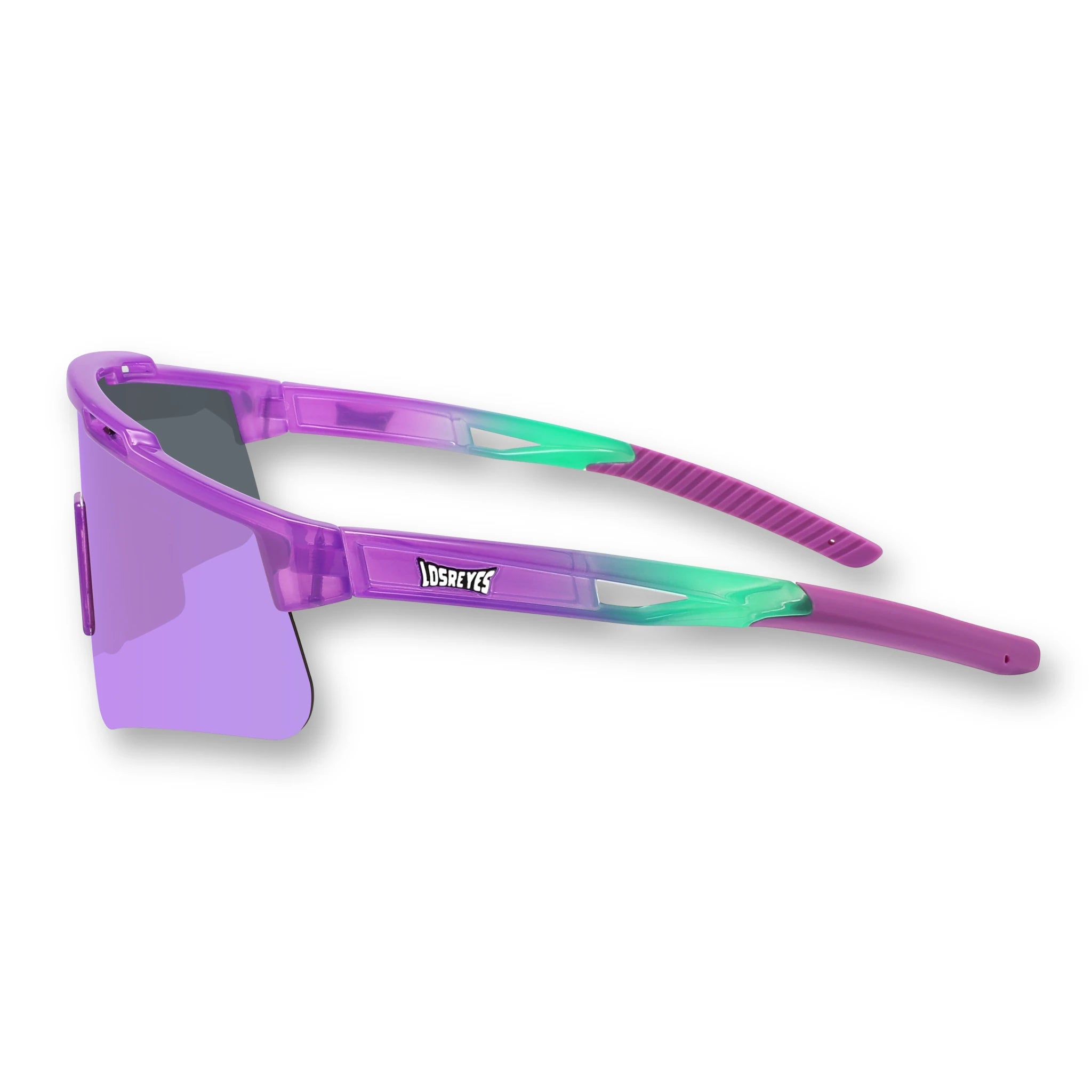 Side profile of LosReyes Prime Jurassic Brontosaurus athletic sunglasses with translucent purple and green frame, soft-grip rubber ear tips, and high-contrast shield lens ideal for youth athletes and fast-action sports.