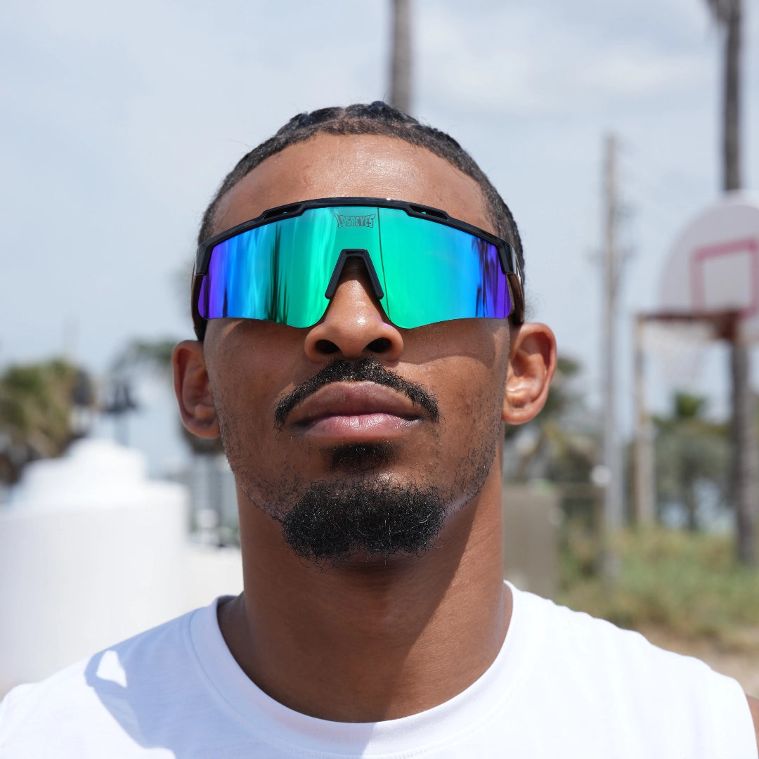 LosReyes Prime Polarized sunglasses with bold green lens on a basketball player – futuristic fit for dynamic court action