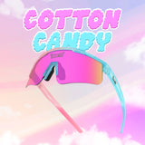 Promotional graphic of LosReyes Prime Youth Cotton Candy sports sunglasses featuring pink and blue UV400 shield lens, sugar-sprinkle inspired frame, and full-wrap protection, displayed with cotton candy clouds background