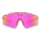 Front view of LosReyes Prime Youth Cream sports sunglasses featuring pink mirrored UV400 shield lens, full wrap fit, and lightweight high-flex frame for active youth athletes.