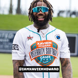 NFL star @iamxavienhoward wearing LosReyes blue mirrored wraparound sports sunglasses at the 2023 Celebrity Softball Game, showcasing premium performance shades designed for athletic excellence and bold outdoor style