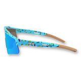 Side view of PRIME YOUTH Cream Blue kids sports sunglasses from the Candy Collection featuring a flexible TR90 frame, rubber grip temple ends, UV400 shield lens, and a secure fit for baseball, running, and football ages 3–12.